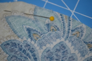 Pin on the same side as your previous stitching